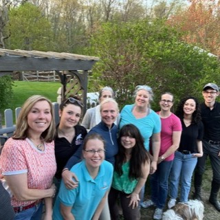The clinic group gathered for a photo in the garden